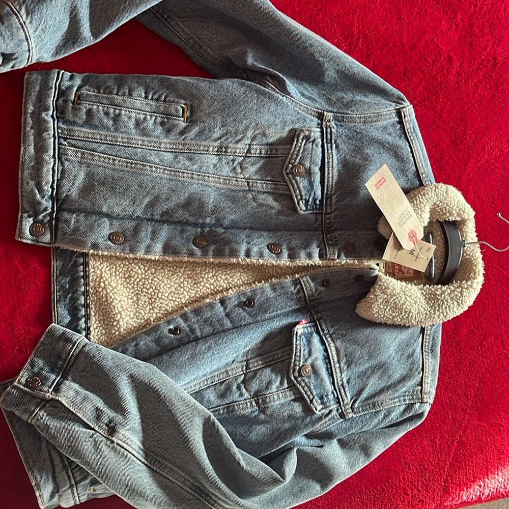 Brand new with tags Levi’s original trucker jacket medium completely lined